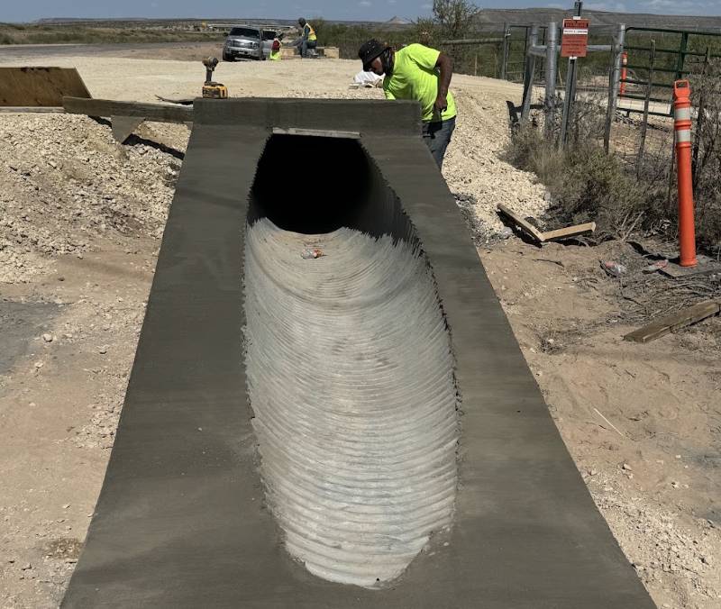 Concrete drainage culvert headwall installation by Permian Paving in Big Spring Texas.